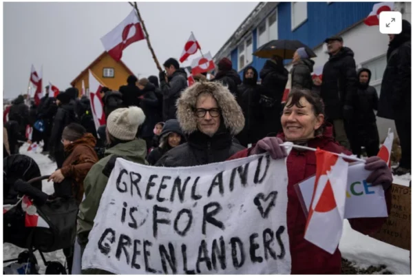People attend a protest against U.S. President Donald Trump's demand that the Arctic island be ceded to the U.S., calling for it to be allowed to determine its own future, in front of the U.S. consulate in Nuuk, Greenland, January 17, 2026